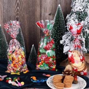 img 2 attached to 🍬 Christmas Cellophane Treat Bags - Pack of 150 with Santa Claus, Candy Cane, and Stocking Print + 150 Twist Ties - Perfect for Party Supplies and Gifting, 3 Festive Styles