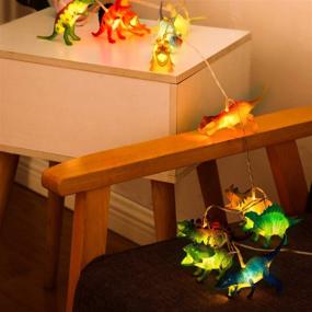 img 1 attached to SAKACACT Dinosaur String Lights for Kids - Realistic 12LEDs 🦕 Dino Light Toy, Super Fun 8 Mode Remote Controlled Children's Gift