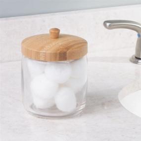 img 3 attached to 🏺 mDesign Glass Bathroom Vanity Storage Organizer: Clear Jar with Bamboo Lid for Cotton Balls, Swabs, Blenders, Makeup Sponges, Bath Salts, Hair Ties, Jewelry