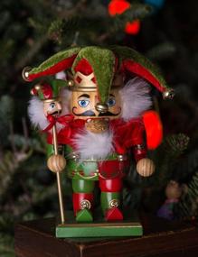 img 1 attached to 🎅 Clever Creations 7 Inch Traditional Wooden Nutcracker in Red and Green Jester Design - Festive Christmas Décor for Shelves and Tables