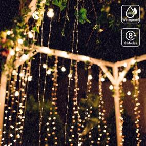 img 2 attached to Outdoor Solar Curtain String Lights, OxyLED 300 LED Fairy Window String Lights Powered by Solar, 🌞 IP65 Waterproof Twinkle String Lights with 8 Modes for Home Garden Patio Porch Backyard Wedding Party Christmas