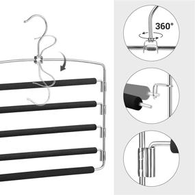 img 1 attached to SONGMICS 5-Layer Swing Arm Pants Hangers Set of 4 - Space Saving and Non-Slip Pants Organizer in Silver and Black UCRI041B03