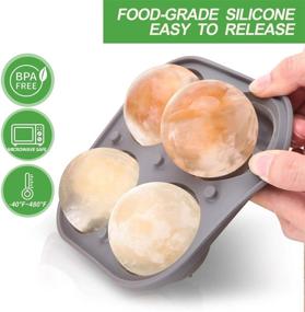 img 1 attached to 🧊 Premium Silicone Ice Cube Mold with Lid - Create Four 2.5-Inch Large Round Ice Balls for Cocktails - Slow Melting Sphere Ice Trays, Reusable and BPA Free