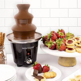 img 2 attached to Nostalgia 24-Ounce Chocolate Fondue Fountain, 1.5-Pound Capacity, 3-Tier for Easy Assembly, Ideal for Nacho Cheese, BBQ Sauce, Ranch, Liqueurs, in Black