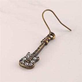 img 1 attached to Spinningdaisy Antique Musical Instrument Earrings Girls' Jewelry