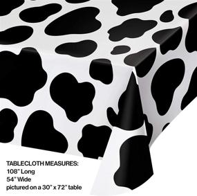 img 1 attached to 🐄 Creative Converting Cow Print Plastic Tablecover, 54x108 Black and White - Durable & Stylish Party Decor