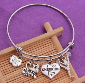 img 2 attached to Cheer Bracelet for Girls: RQIER Expandable Wire Bangle Gift for Cheerleaders, Cheer Teams, and Coaches