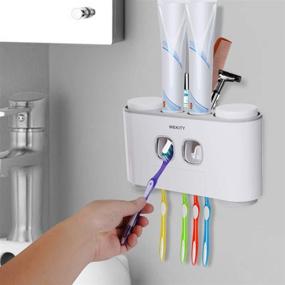 img 3 attached to 🪥 Organization and Convenience in One: Wall-Mounted Toothbrush Holder with Toothpaste Dispenser, 5 Slots, 2 Squeezers, and 4 Cups - Grey