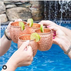 img 2 attached to 🍹 COPPure Moscow Mule Copper Mugs Set of 4 - 100% Solid Hammered, Unlined Copper Cups for Icy Cold Cocktails - Recipes & Gift Ready Packaging Included