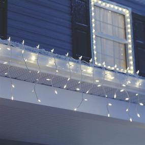 img 1 attached to 🎄 NOMA LED Christmas Icicle String Lights, 70 Mini Warm White Bulbs, Indoor & Outdoor, 6.5 Ft. White Wire Strand" - slightly optimized version