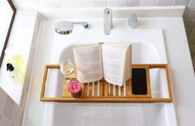 img 1 attached to Enhance Your Bathing Experience with DOZYANT Bamboo Bathtub Tray Caddy: A Multi-functional Wooden Bath Tray Table with Extending Sides, Reading Rack, Tablet Holder, Cellphone Tray, and Wine Glass Holder