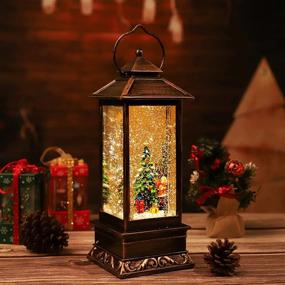 img 1 attached to 🎅 Christmas Lantern Snow Globe Decoration with Singing, Glittering Snow Swirling Booth for Christmas Tree, Garden, Bedroom Parties - Ideal Christmas Home Decoration and Gift