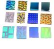 assorted dichroic clear glass pieces logo
