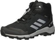 👞 unisex-child terrex mid gtx hiking boot by adidas outdoor logo