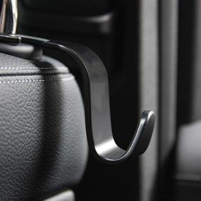 img 1 attached to 🚗 Универсальные крючки для сиденья автомобиля 4 шт. - органайзер для хранения сумки, кошелька, пальто - черный тип S - подходит для большинства автомобилей.