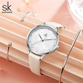 img 2 attached to ⌚ Женские водонепроницаемые часы SHENGKE с простым циферблатом и кожаным ремешком - Женские часы Relogio