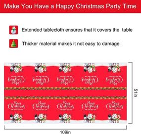 img 2 attached to 🎄 Премиум Рождественские скатерти, 2 шт. Прямоугольные одноразовые скатерти - покрывала на стол 52 на 110 дюймов с рисунками лося, снеговика и Санта-Клауса - пластиковые скатерти для праздничного рождественского декора