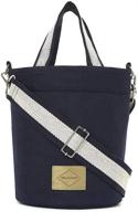 👜 eco-friendly navy and ivory reversible bucket bag for women: sustainable polyester and cotton canvas with handle and shoulder straps - iwp i was plastic logo