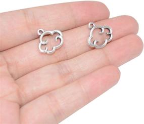 img 1 attached to Yansanido Pack of 50 Silver Alloy Cloud Charms: Perfect for DIY Bracelets, Necklaces, Zipper & Cellphone Pendants!