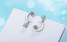 img 1 attached to 🌙 SLUYNZ 925 Sterling Silver CZ Crystal Star Moon Asymmetric Studs Earrings for Women and Teen Girls - Sparkling Studs Earrings