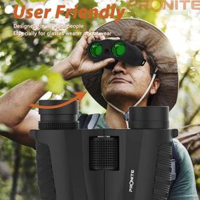 img 1 attached to 🔭 PRONITE Compact Binoculars for Adults - High Definition 10x25 Bird Watching Binoculars with Powerful BAK4 Prism Lens for Hunting, Outdoor Sports, Travel and Concerts