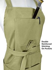 img 2 attached to 🎨 Premium Cross Back Artist Apron with Fasten/Quick Release Buckle, 6 Pockets including Zipper Pocket & 2 Towel Loops for Artists or Kitchen - Adjustable M to XXL, 27"x31" - Durable 100% Cotton Canvas