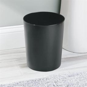 img 2 attached to mDesign Small Round Metal Trash Can - Durable Steel Garbage Bin for Bathrooms, Powder Rooms, Kitchens, Home Offices - Black