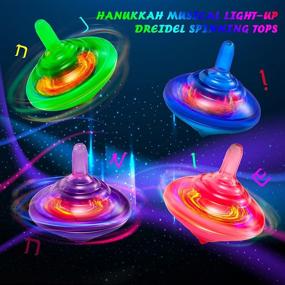 img 2 attached to 🔆 Light-Up Spinning Tops: Hanukkah Musical Toys with LED Lights - Perfect for Christmas Hanukkah Party Favors and Birthday Presents! 4 Assorted Colors