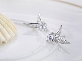 img 4 attached to Stylish Eternity J. Silver Crystal Angel Wings Earrings – Allergy-Free Ear Studs for a Cute Christmas Gift