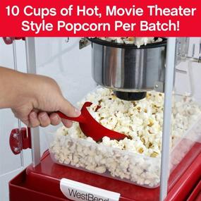 img 3 attached to 🍿 West Bend PCMC20RD13 Popcorn Cart - 2.5-Ounce Non-Stick Stainless Steel Kettle - Makes 10 Cups - Prep Shelf Storage and Wheels for Easy Mobility - Includes Measuring Tool - Red