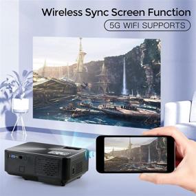 img 2 attached to 📽️ Wi-Fi-проектор, WeChip 8500L HD на открытом воздухе мини-проектор с поддержкой 1080P, совместимый с экраном 120" - кинотеатр для домашнего просмотра фильмов, подключаемый к ТВ-приставкам, видеоиграм, HDMI, USB, VGA, AV-подключение, ноутбук, устройства iOS и Android.