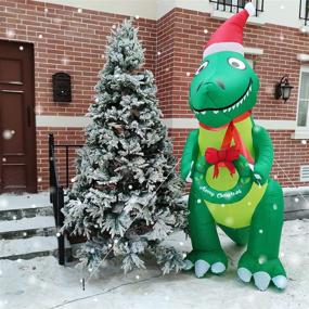 img 1 attached to 🎅 Captivating 10 Ft Tall Inflatable Christmas Dinosaur: Blow up Santa Dino with LED Lights, Merry Xmas Wreath, & Tether Stakes - Perfect Outdoor Decor for Holiday Yard, Lawn & Garden Home Parties