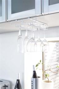 img 2 attached to YAMAZAKI Home 2464 Shelf Wine Glass Rack: Convenient Hanging Storage Holder in White - One Size