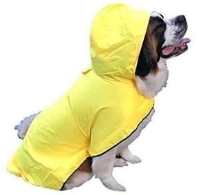 img 1 attached to 🐶 XL Yellow Waterproof Dog Raincoat with Hood by HugeHounds - Includes Carry Pouch