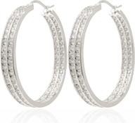enhance your style with 18k gold plated inside-out hoop earrings embellished with cz logo