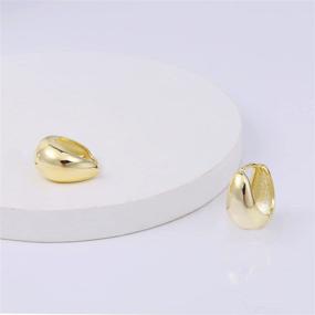 img 1 attached to Hypoallergenic 14K Gold Chunky Huggie Hoop Earrings for Girls - Small Thick Huggie Hoops