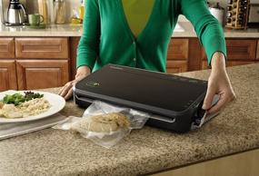 img 2 attached to 🔒 FM2100-000 FoodSaver Vacuum Sealer Machine System - Starter Vacuum Seal Bags & Rolls Included, Safety Certified, in Black