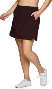 img 1 attached to 🏃 RBX Active Women's Plus Size Stretch Woven Athletic Skort: With Bike Short, Pockets & Ultimate Comfort
