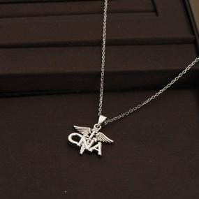 img 2 attached to CENWA CNA Necklace – Certified Nursing Assistant Charm Pendant with Caduceus Angel, Ideal Gifts for Nursing Students