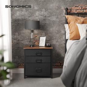 img 3 attached to 🛏️ Rustic Brown and Black Industrial Nightstand with 3 Fabric Drawers, Steel Frame, and Wooden Top - SONGMICS ULTS213B01