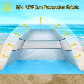 img 2 attached to Wilwolfer Beach Tent Pop Up Sun Shelter with Canopy Shade - Portable UV Protection, Easy Setup, Windproof & Stable for 3 or 4 Person Outdoor Activities (Blue) - Includes Carry Bag