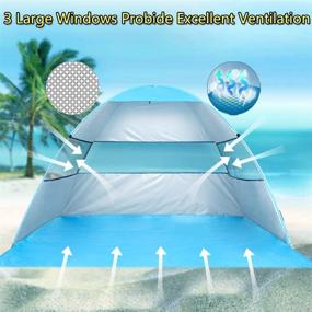 img 1 attached to Wilwolfer Beach Tent Pop Up Sun Shelter with Canopy Shade - Portable UV Protection, Easy Setup, Windproof & Stable for 3 or 4 Person Outdoor Activities (Blue) - Includes Carry Bag