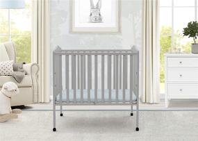 img 3 attached to ✨ Grey Delta Children Folding Portable Mini Baby Crib with 1.5-inch Mattress - Enhanced SEO