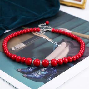 img 3 attached to 💎 Ювелирный набор Femtindo Black Faux Pearl для женщин - ожерелье, серьги и браслет - костюмные аксессуары