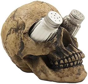 img 1 attached to Spooky Halloween Party Decorations - Scary Evil Human Skull Salt and Pepper Shaker Set with Display Stand Holder for Gothic Kitchen Decor. Perfect for Collectibles, Novelty Gifts, and Home-n-Gifts