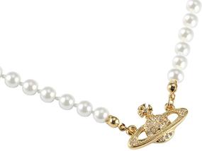 img 3 attached to 🌟 Vivienne Westwood Golden Saturn Pearl Necklace: Exclusive Packaging Included