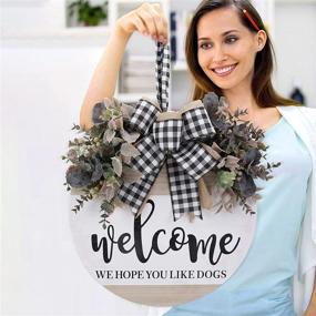 img 1 attached to 🚪 GLUUFLOWER 17 Inch Welcome Wooden Sign for Front Door - We Love Dogs - Hanging Home Decoration with Eucalyptus Wreath & Buffalo Bow - Outdoor/Indoor Door Wall Decor in Dusty Mauve