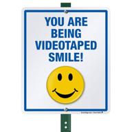 smartsign smile being videotaped aluminum logo