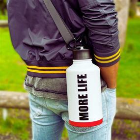 img 3 attached to 64 oz Insulated Water Bottle MORE LIFE – Vacuum Sports Water Bottle - Modern Hot Cold Flask BPA FREE Half Gallon Metal Water Jug - Includes 2 Hydro Thermal Lids with Straw & Shoulder Carry Strap - Light Grey
