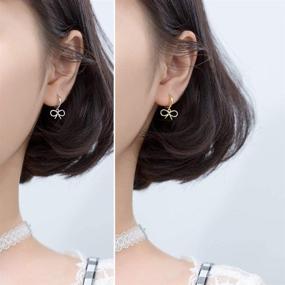 img 1 attached to Stylish Sterling Silver Dangle Butterfly Round Huggie Hoops: Fashion 🦋 Bow Knot Small Hoop Earrings for Women & Teen Girls - 8mm